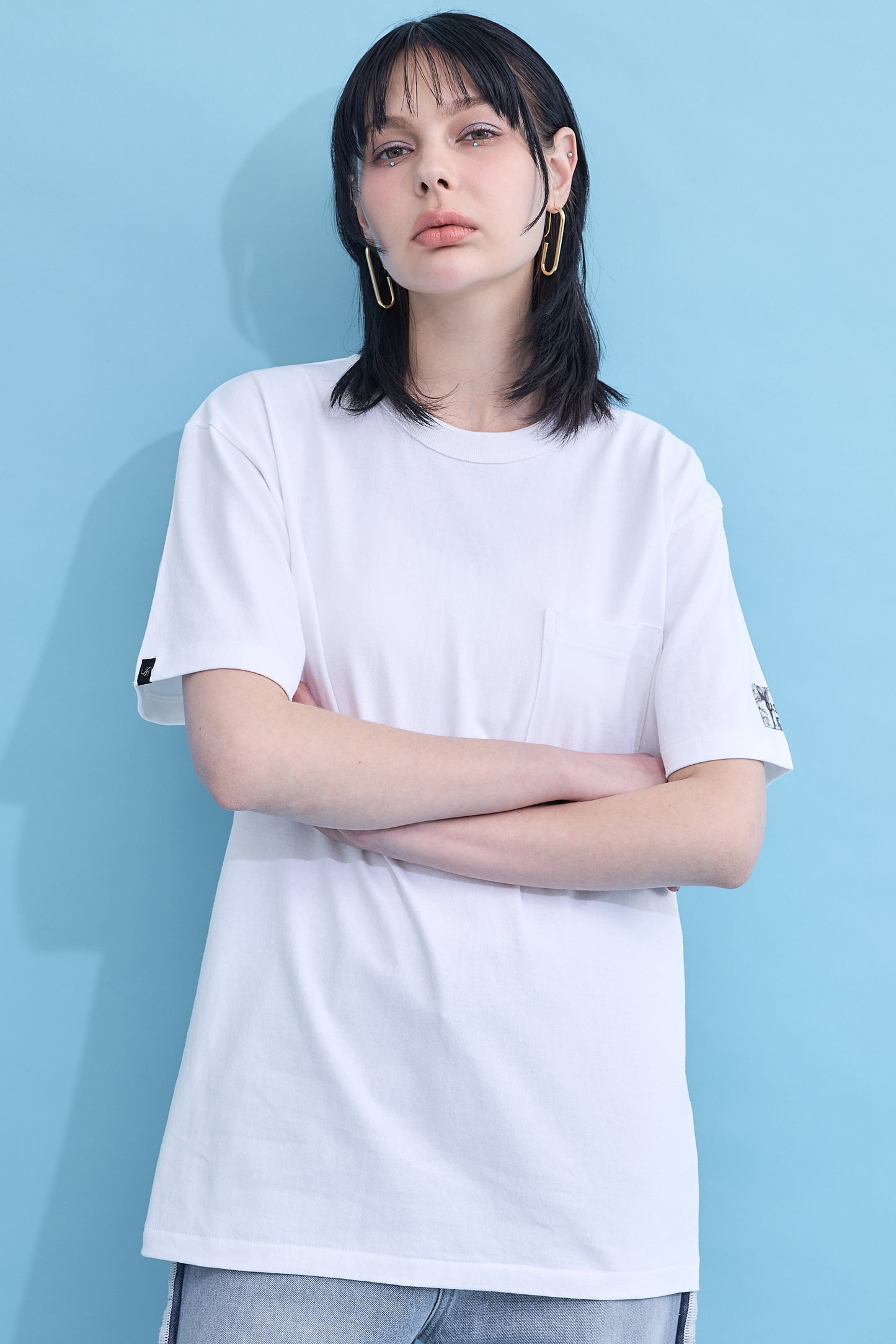 W name pocket over T-shirt