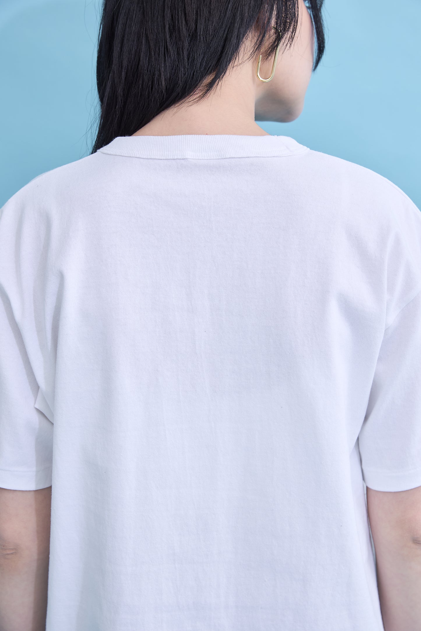 W name pocket over T-shirt