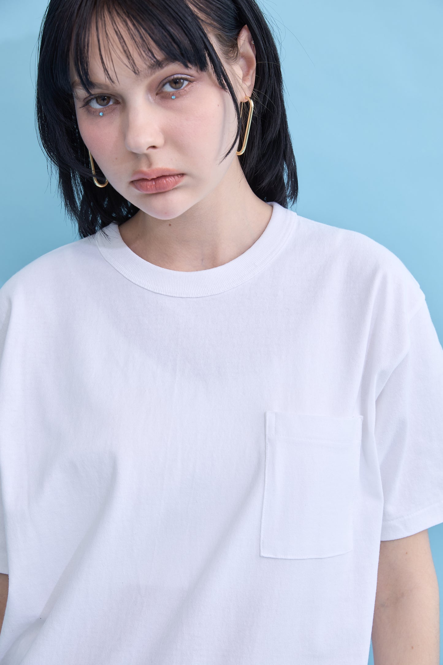 W name pocket over T-shirt