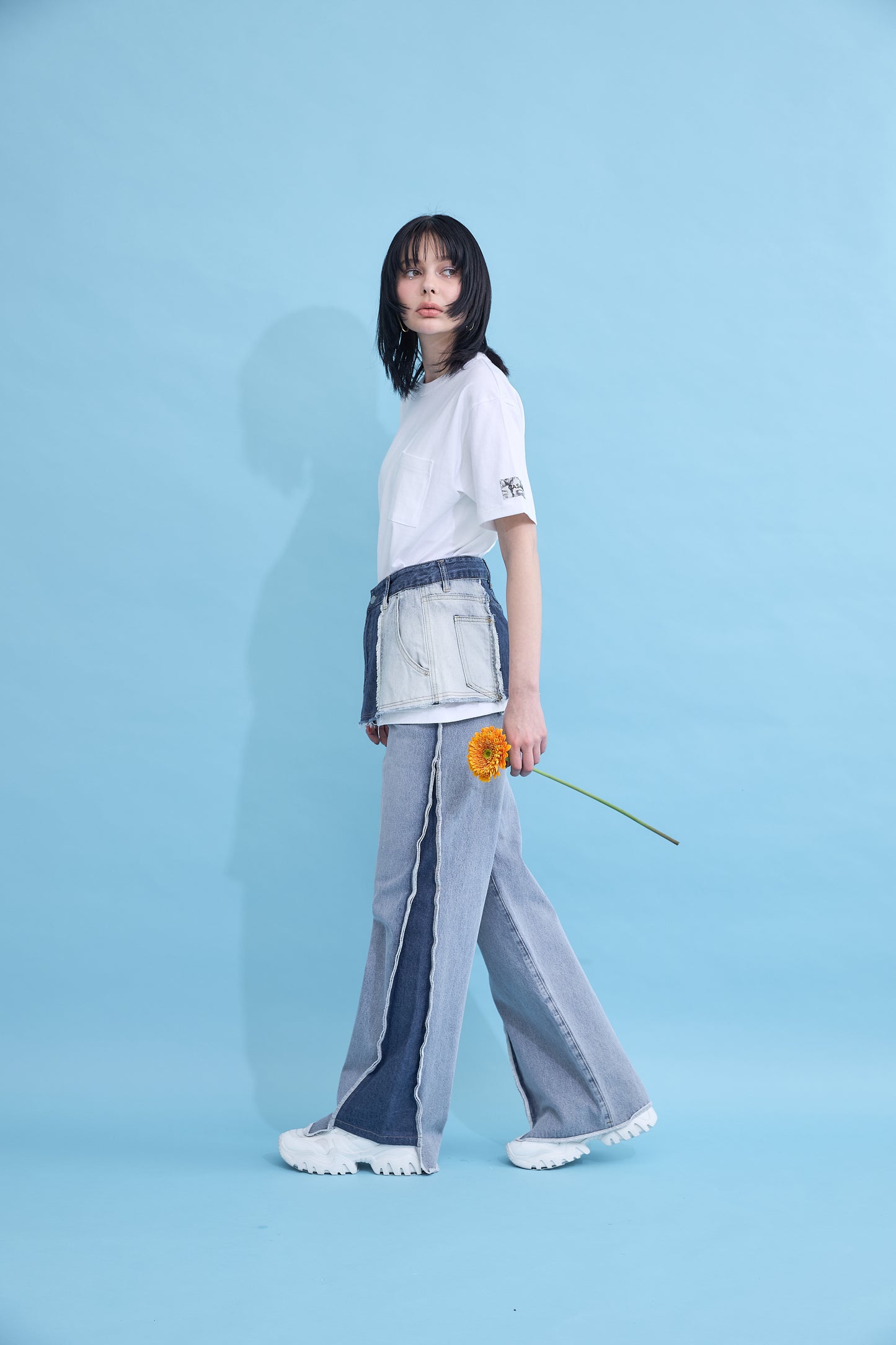 W name pocket over T-shirt