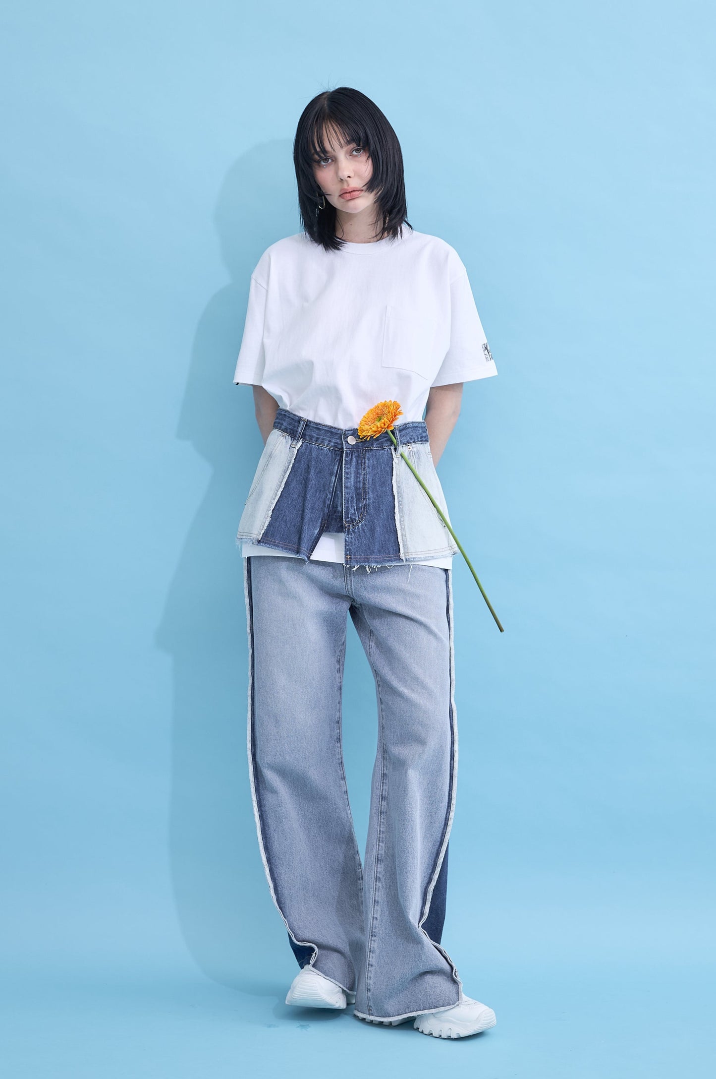 W name pocket over T-shirt