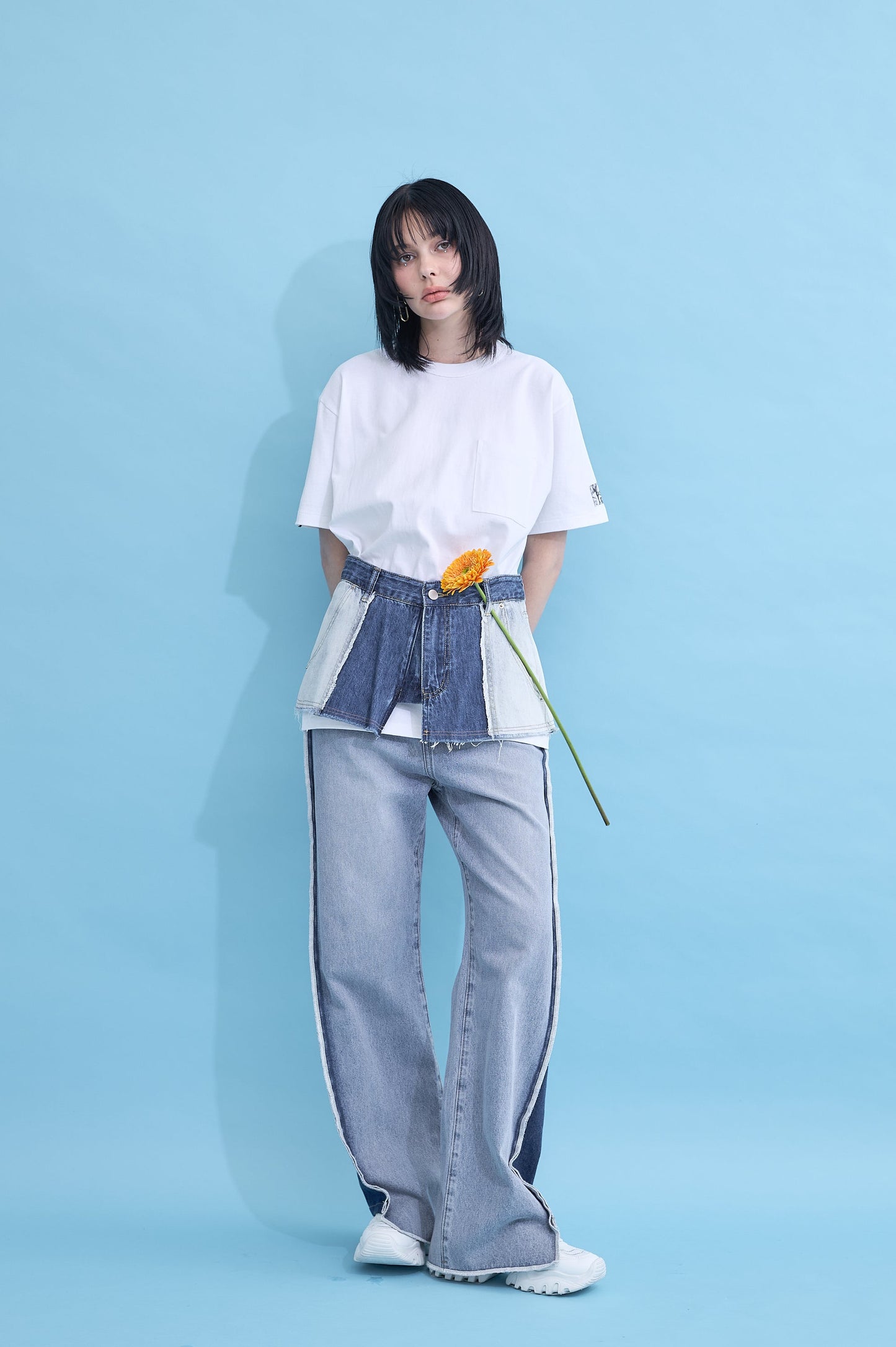 W name pocket over T-shirt