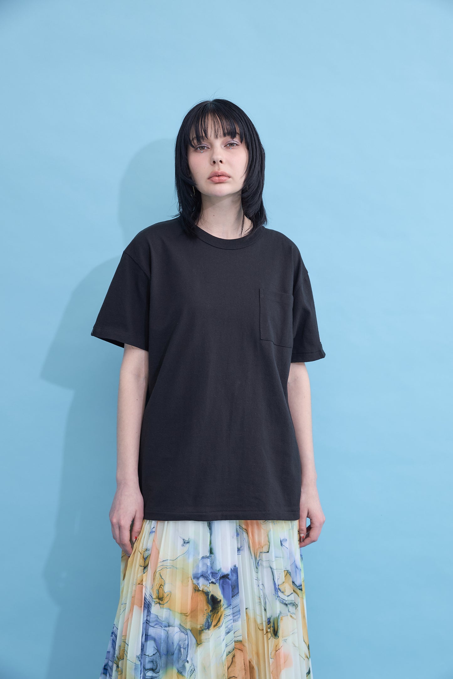 W name pocket over T-shirt