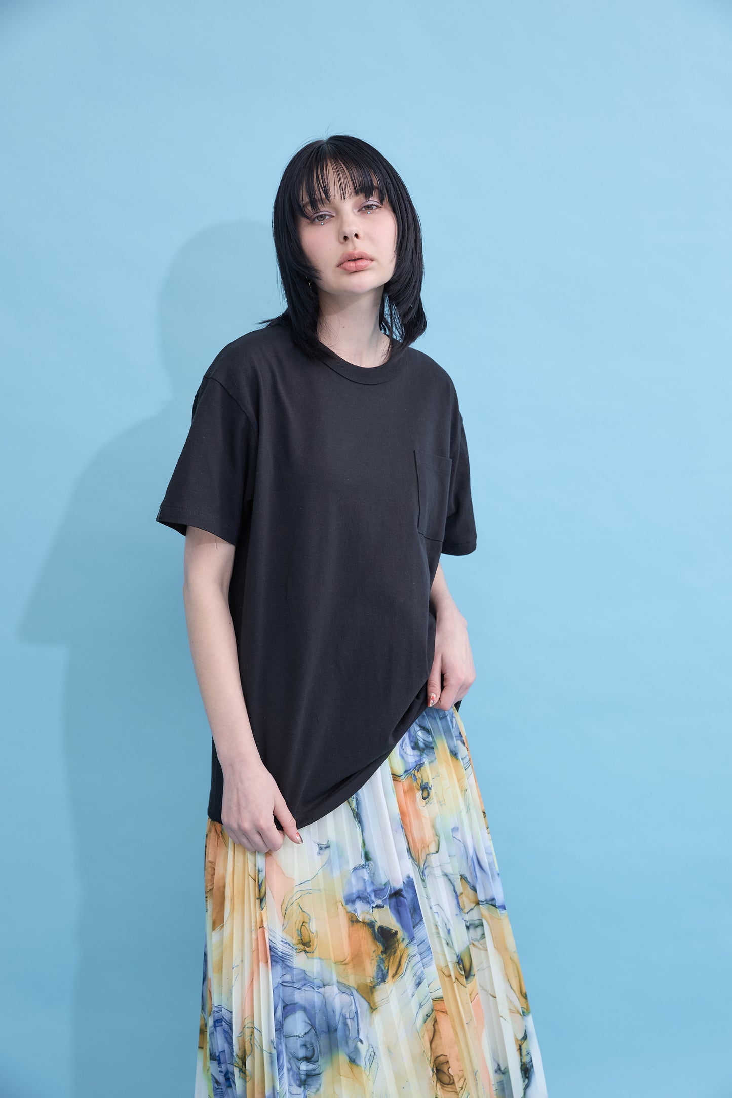 W name pocket over T-shirt