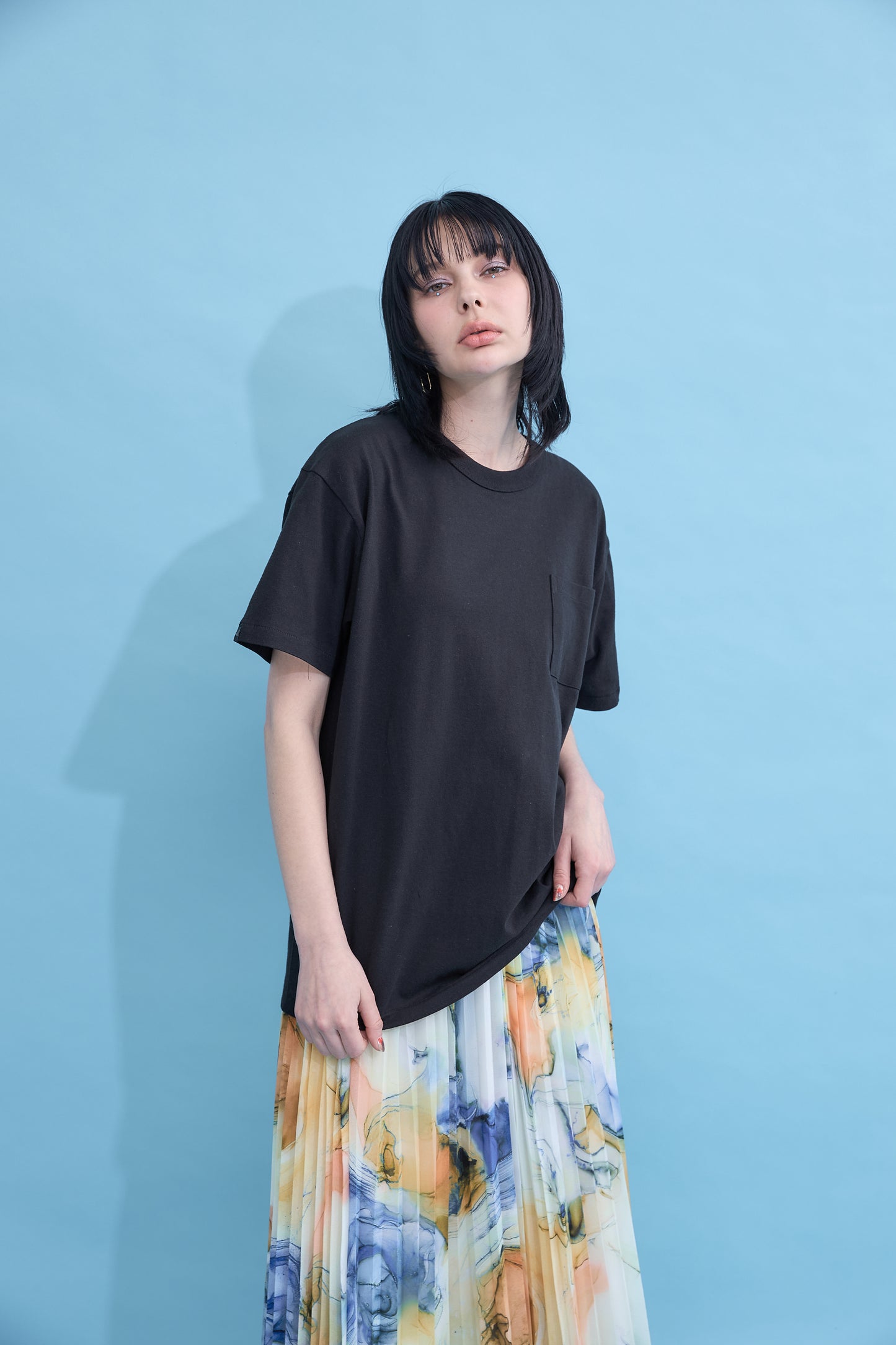 W name pocket over T-shirt