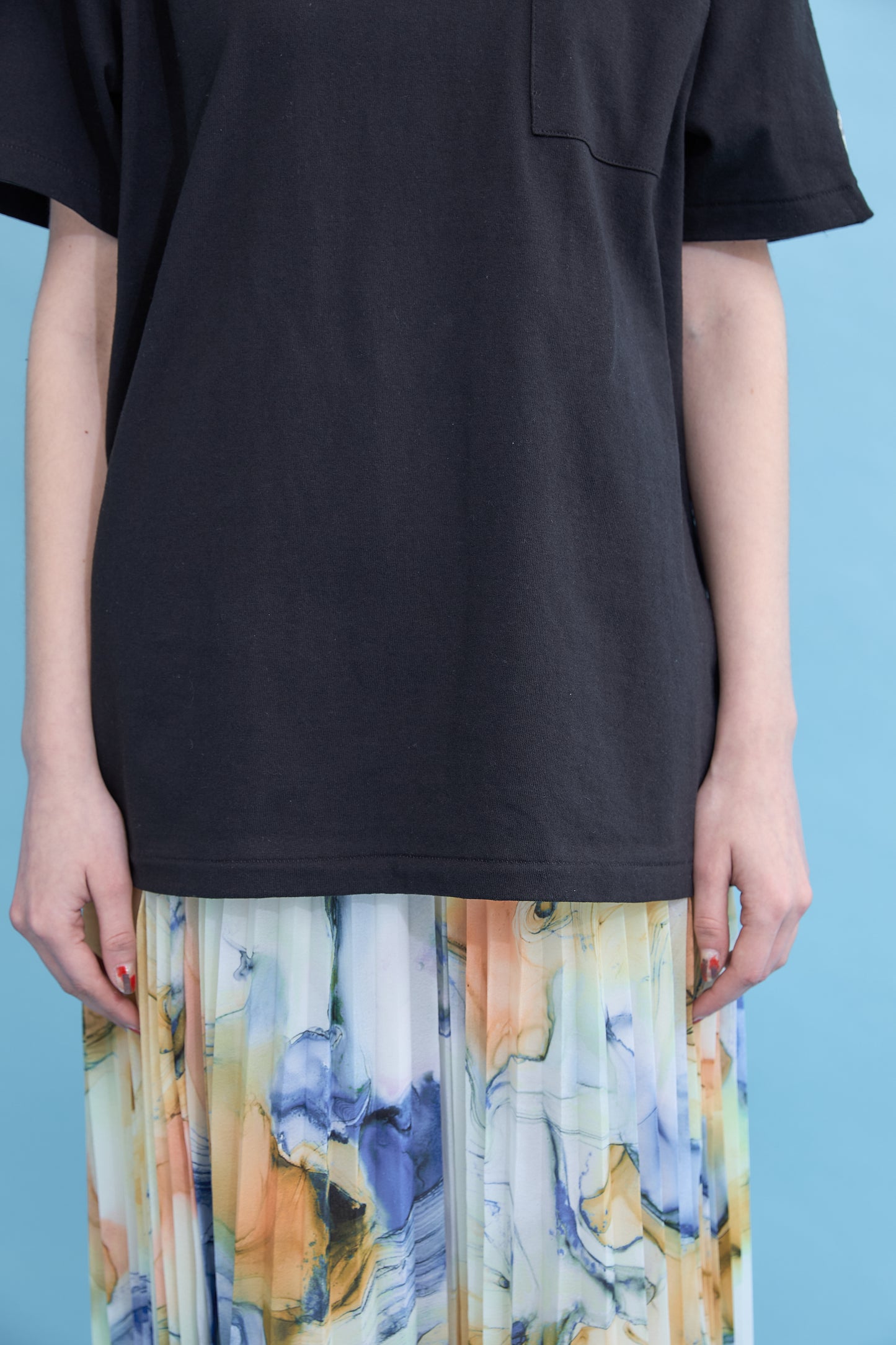 W name pocket over T-shirt