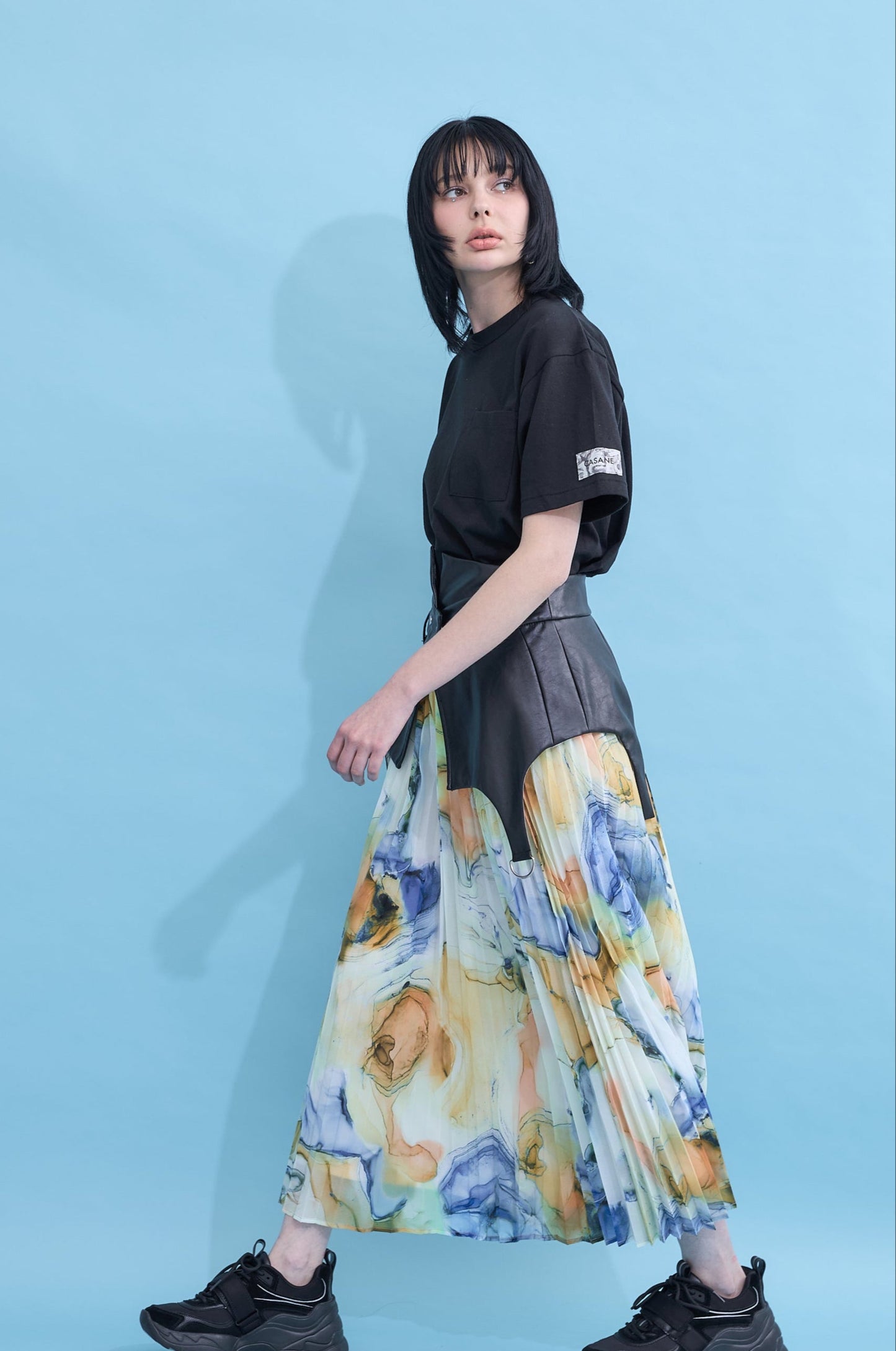 W name pocket over T-shirt