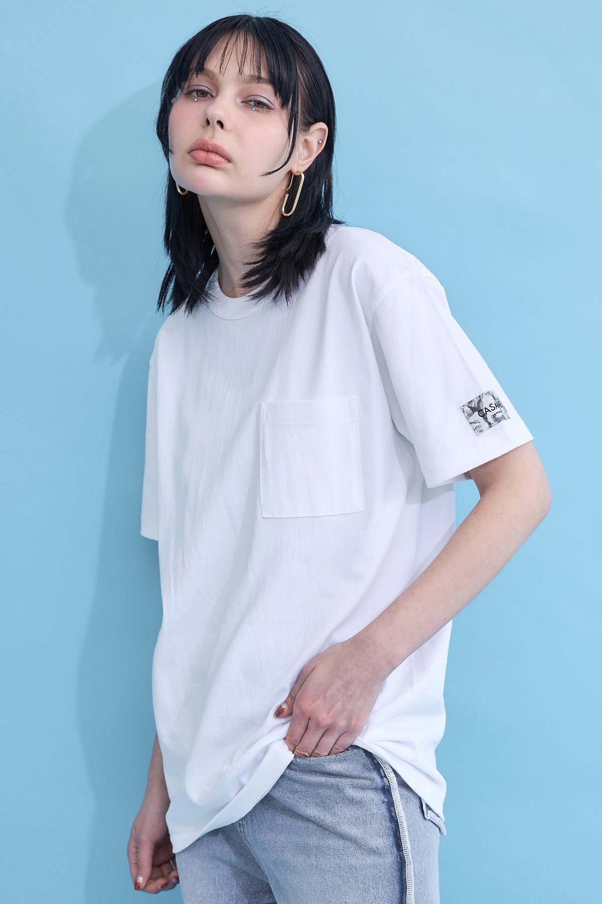 W name pocket over T-shirt