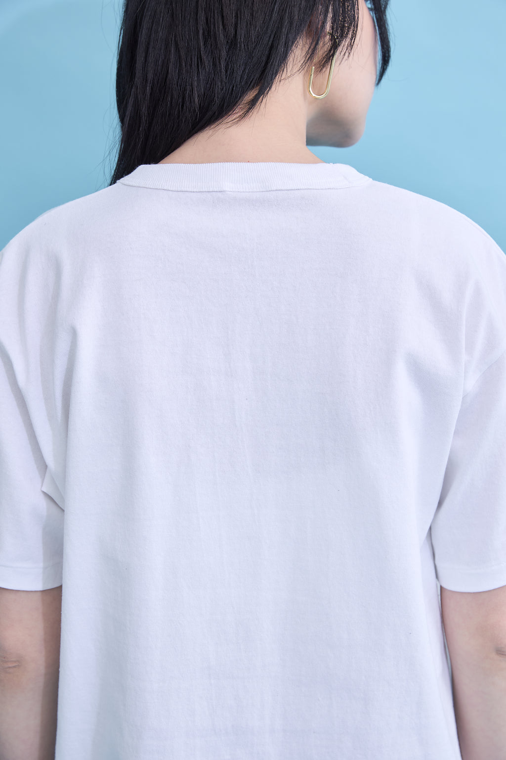 W name pocket over T-shirt