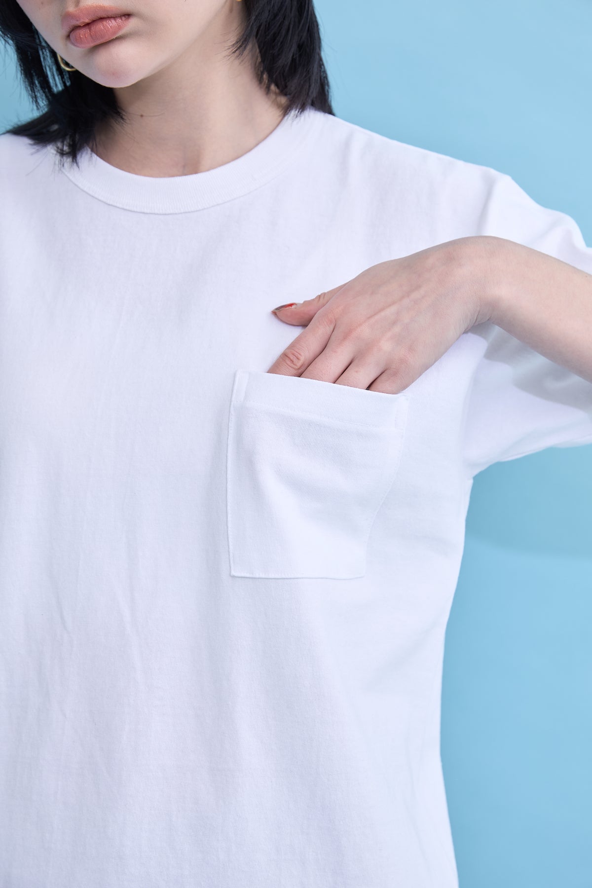 W name pocket over T-shirt