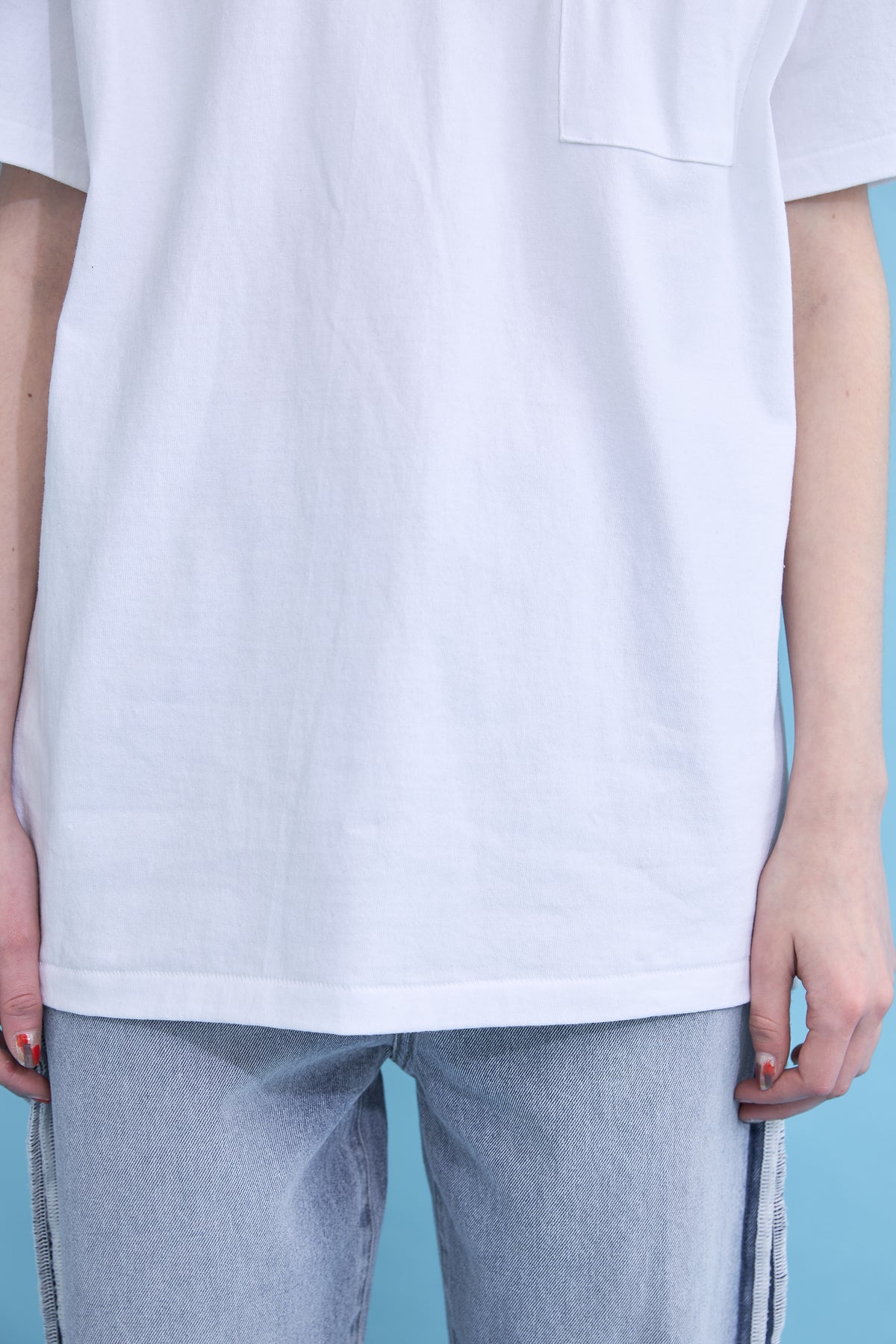 W name pocket over T-shirt