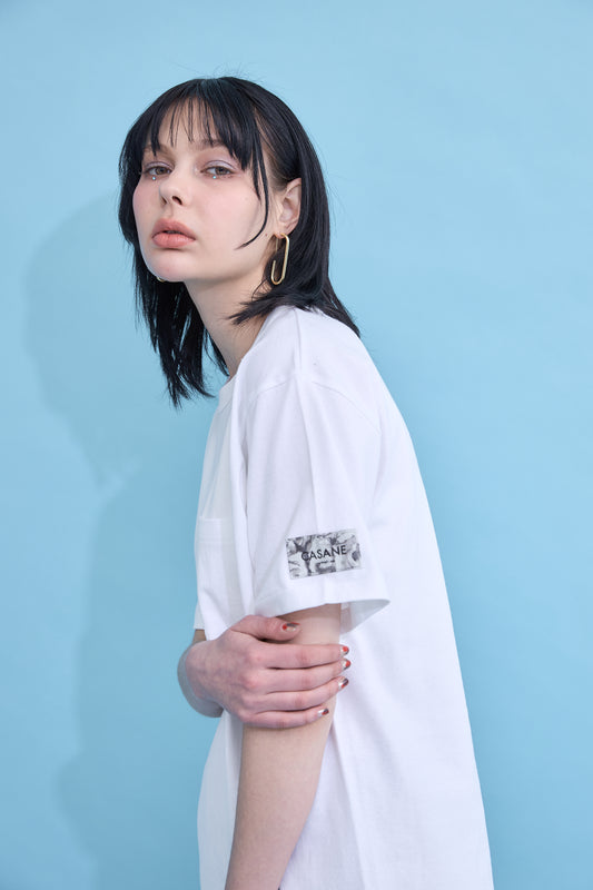 W name pocket over T-shirt