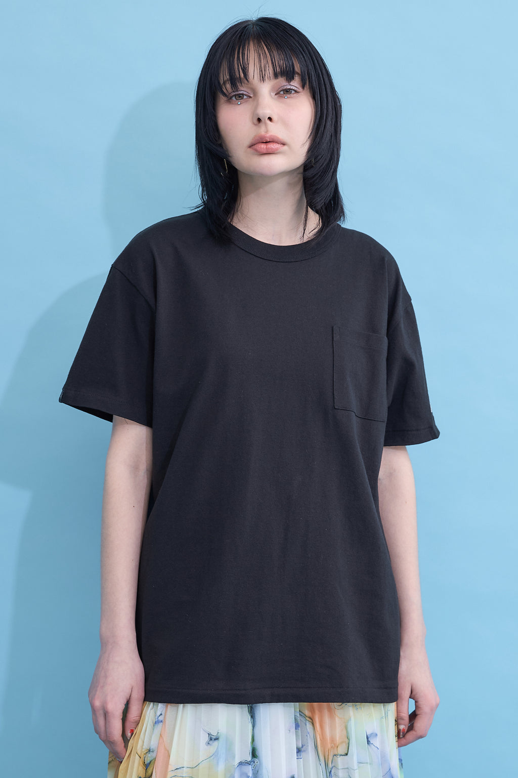 W name pocket over T-shirt