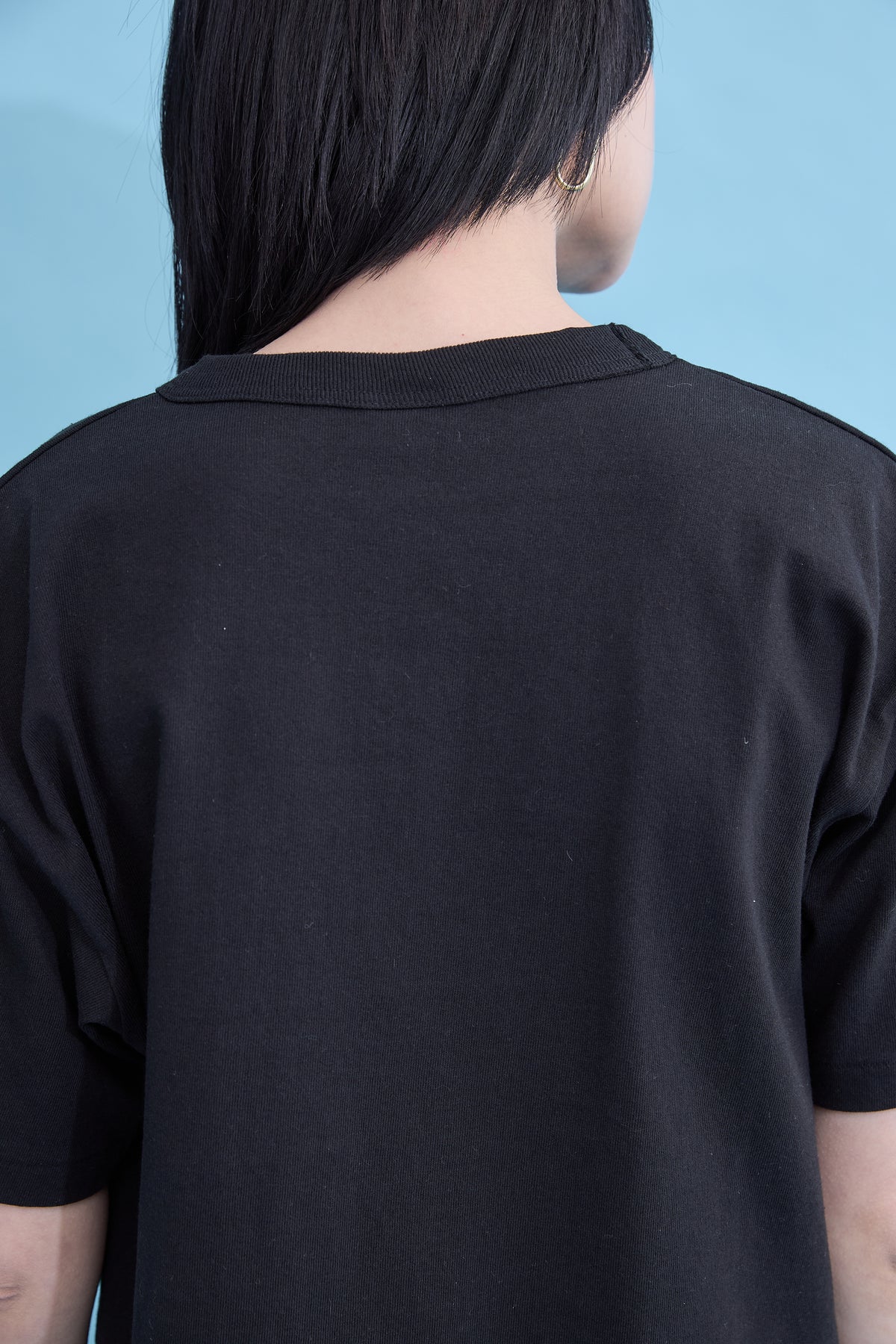 W name pocket over T-shirt